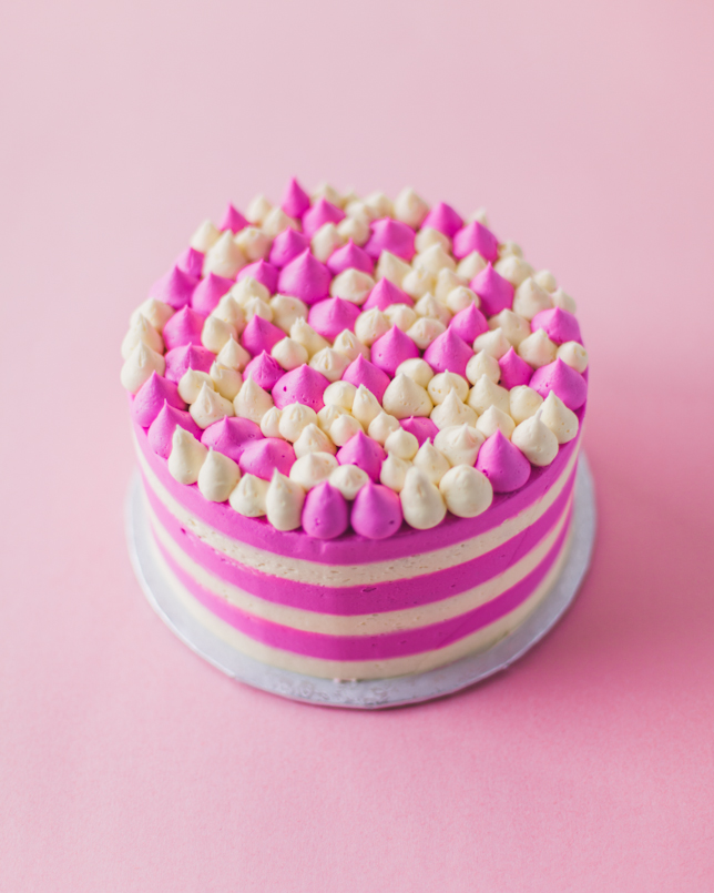pink striped buttercream cake