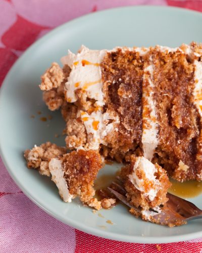 close up of apple caramel cake with oatmeal cookie crumbles