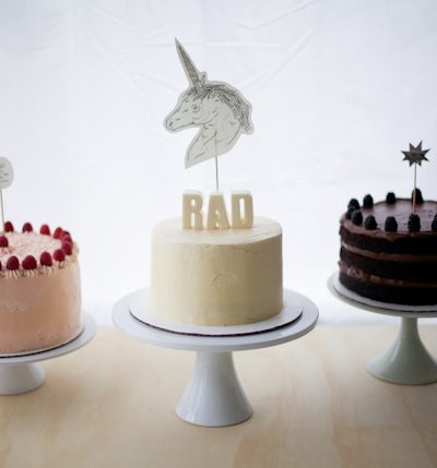 buttercream wedding cakes with unicorn cake topper