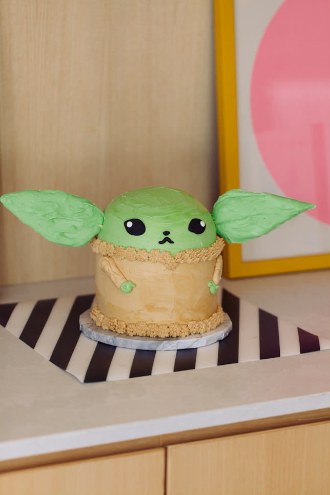 Extra cute Baby Yoda cake made of buttercream with candy melt ears