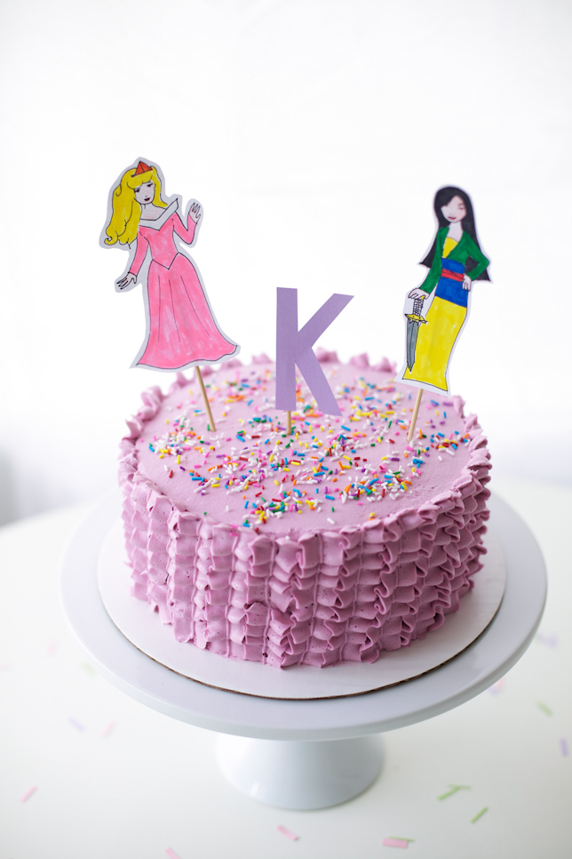 hand drawn princess cake toppers on ruffle cake - coco cake land