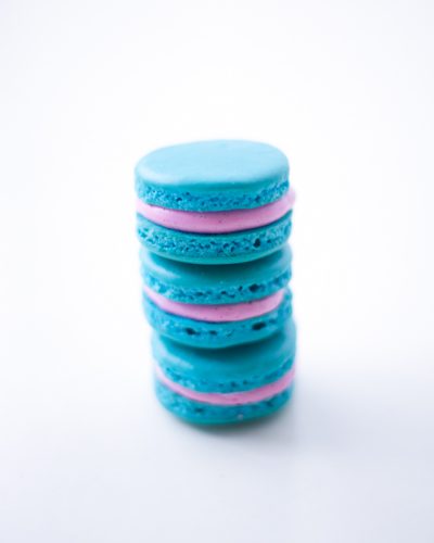 pretty stack of vibrant macarons and tips on how to make them - coco cake land