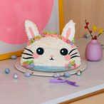 buttercream piped easter bunny cake with super cute fondant face, whiskers and candy easter eggs