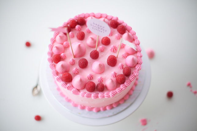 raspberry and meringue topped pink party cake