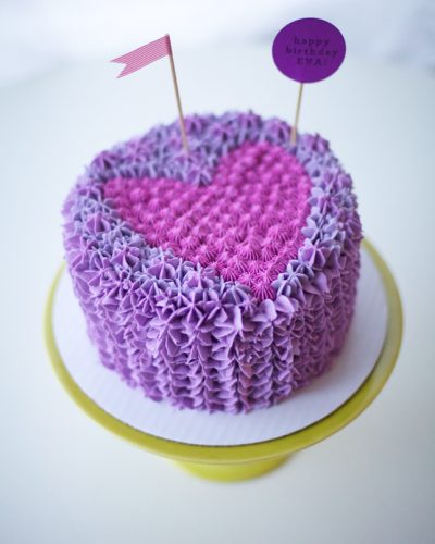 purple and pink ruffle heart cake