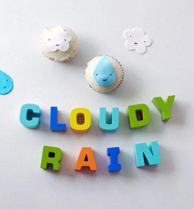 cloudy rain letters next to cupcakes