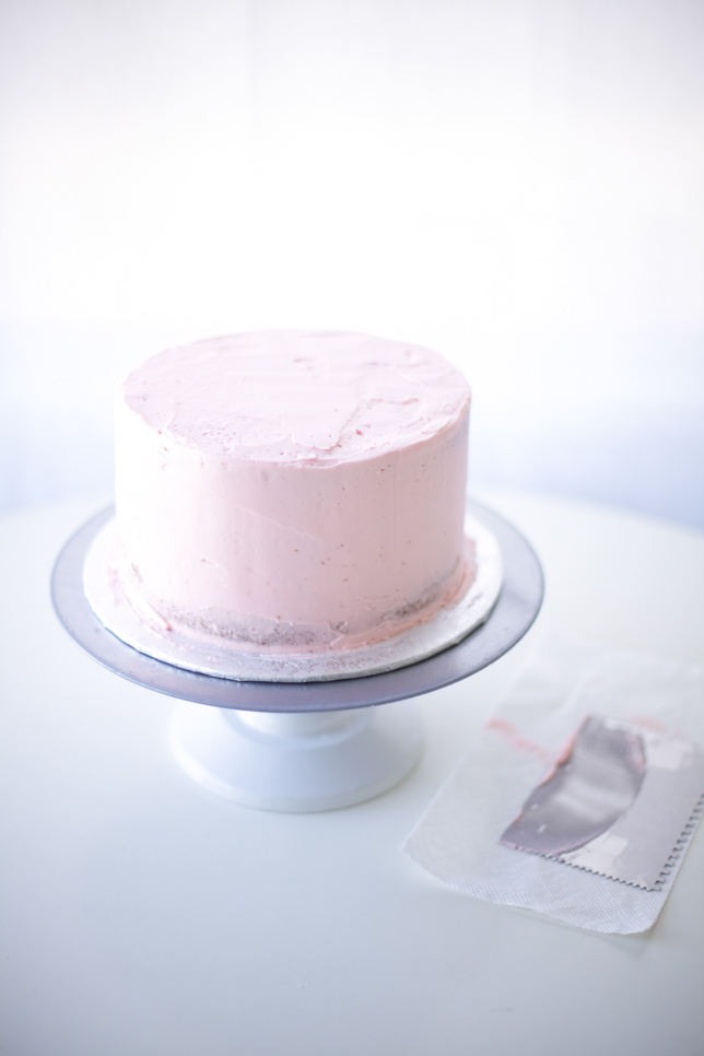 pink buttercream frosted cake 