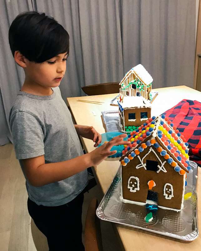 teddy decorating gingerbread house